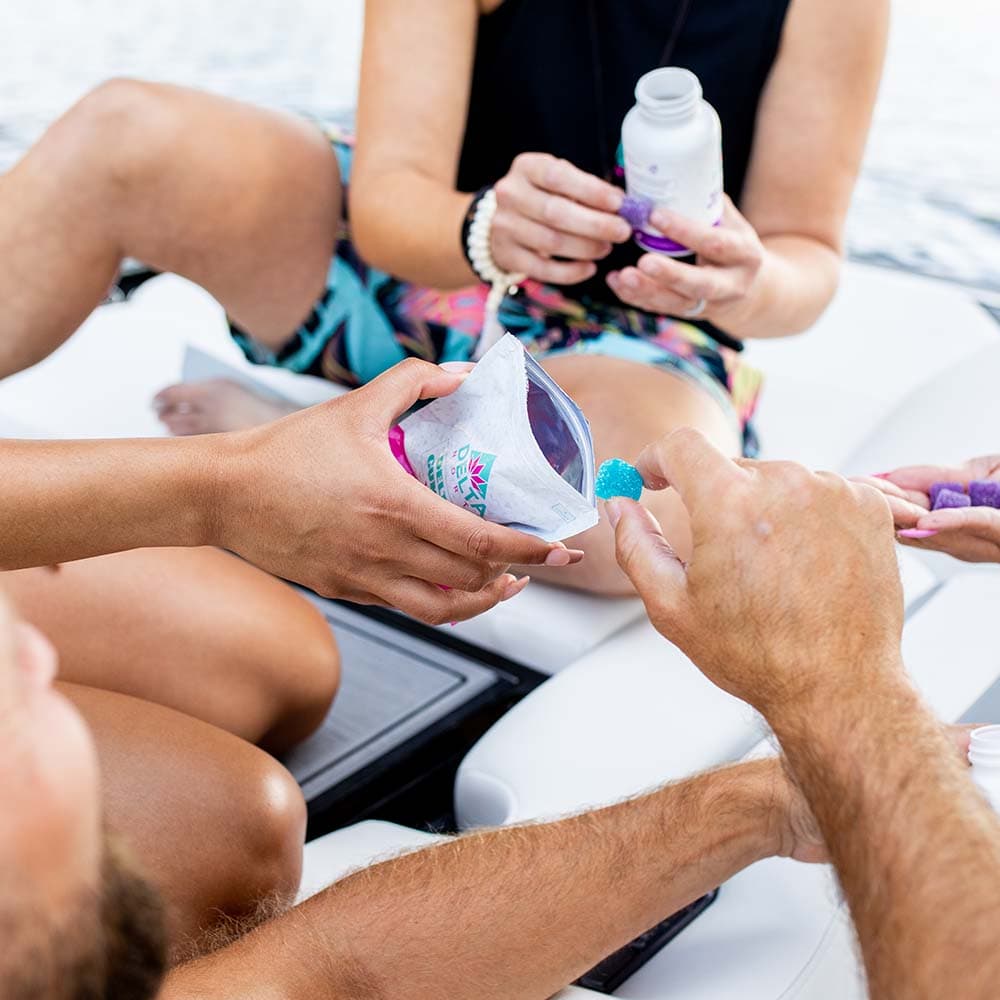 People on boat eating delta-8 gummies 100 mg