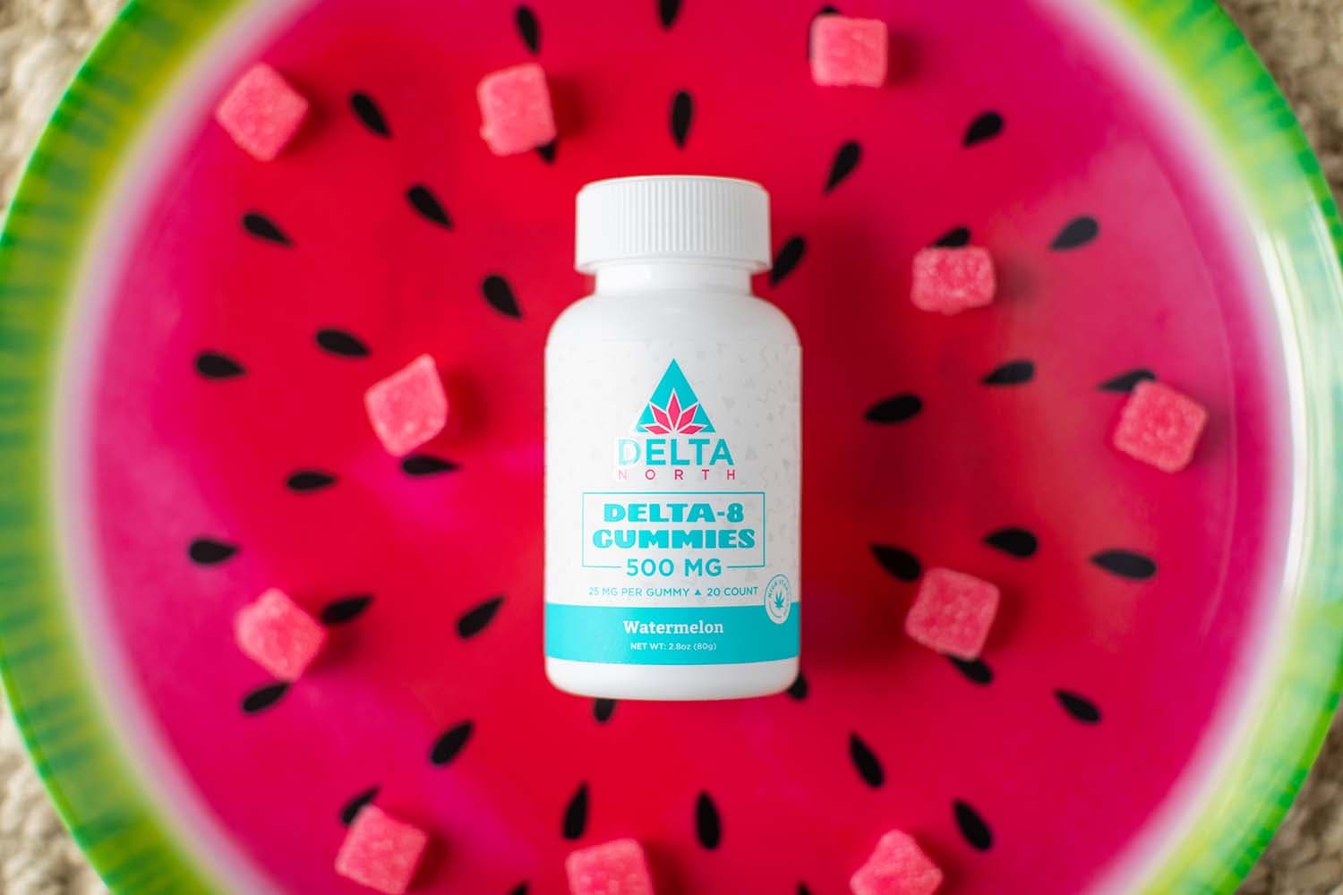 Delta-8 watermelon gummies on watermelon background