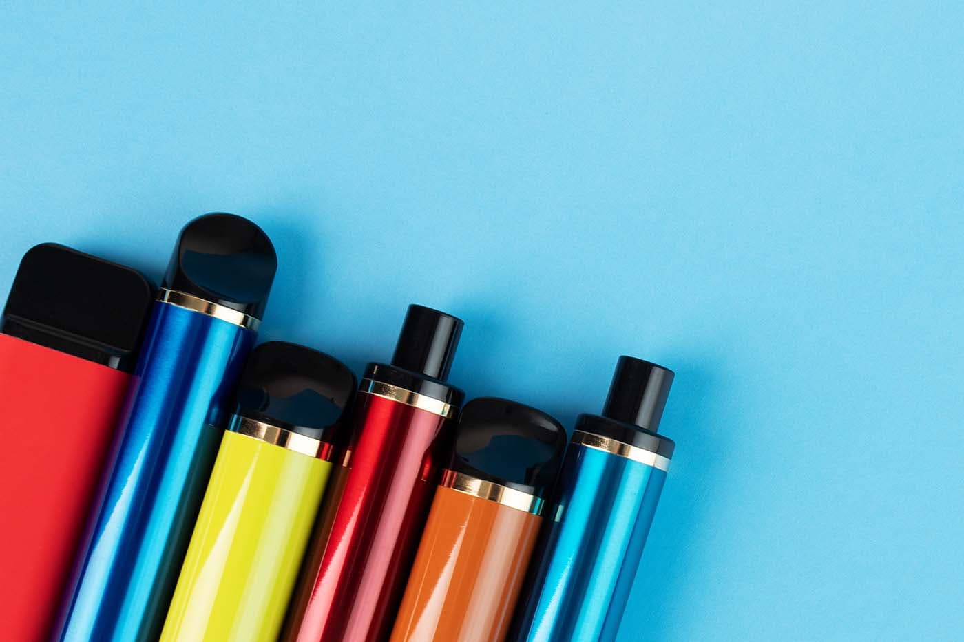 Various delta 8 THC carts on blue background