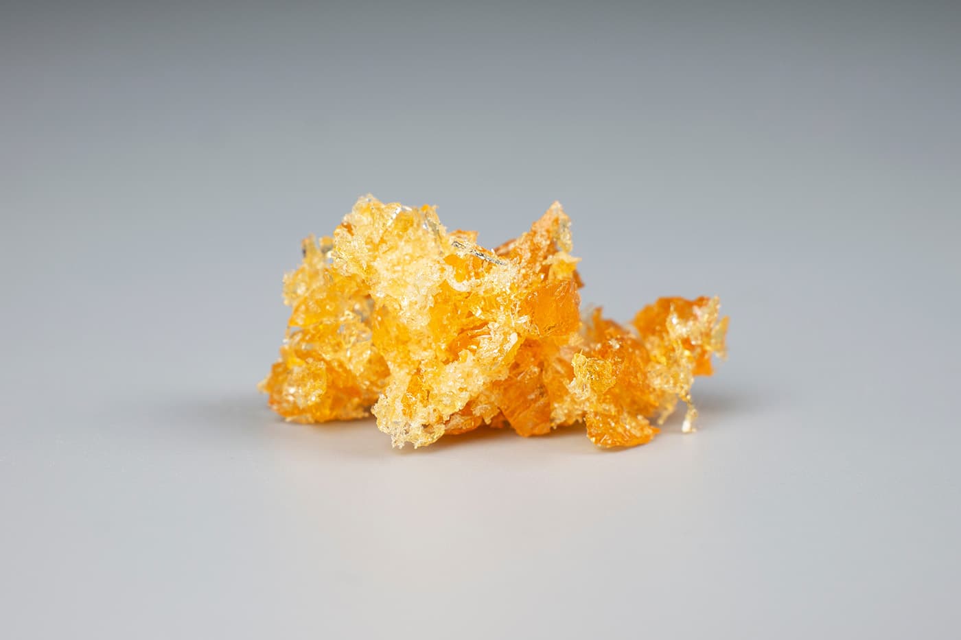 Delta 8 THC distillate on grey background