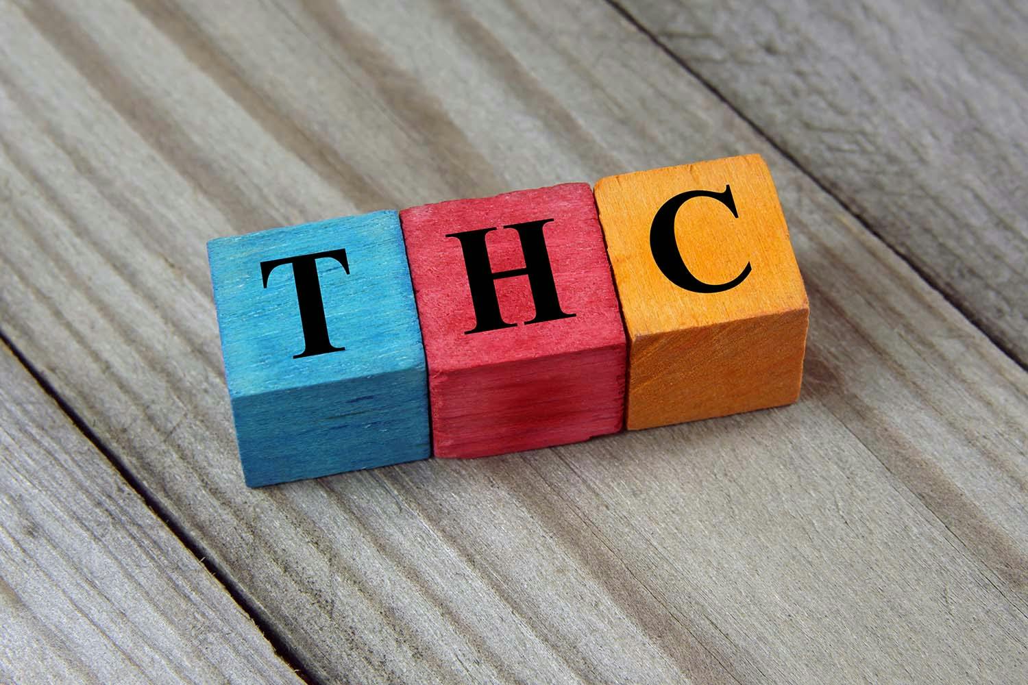 What Is THC featured image on wood table