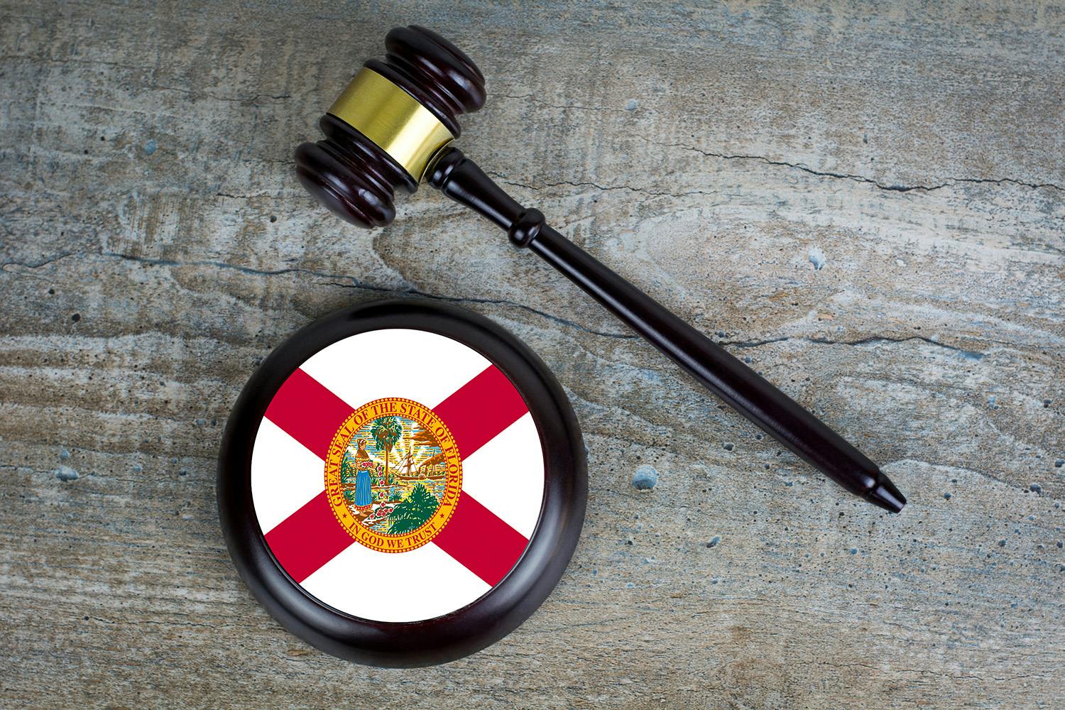 Legal gavel with pad showing Florida state flag